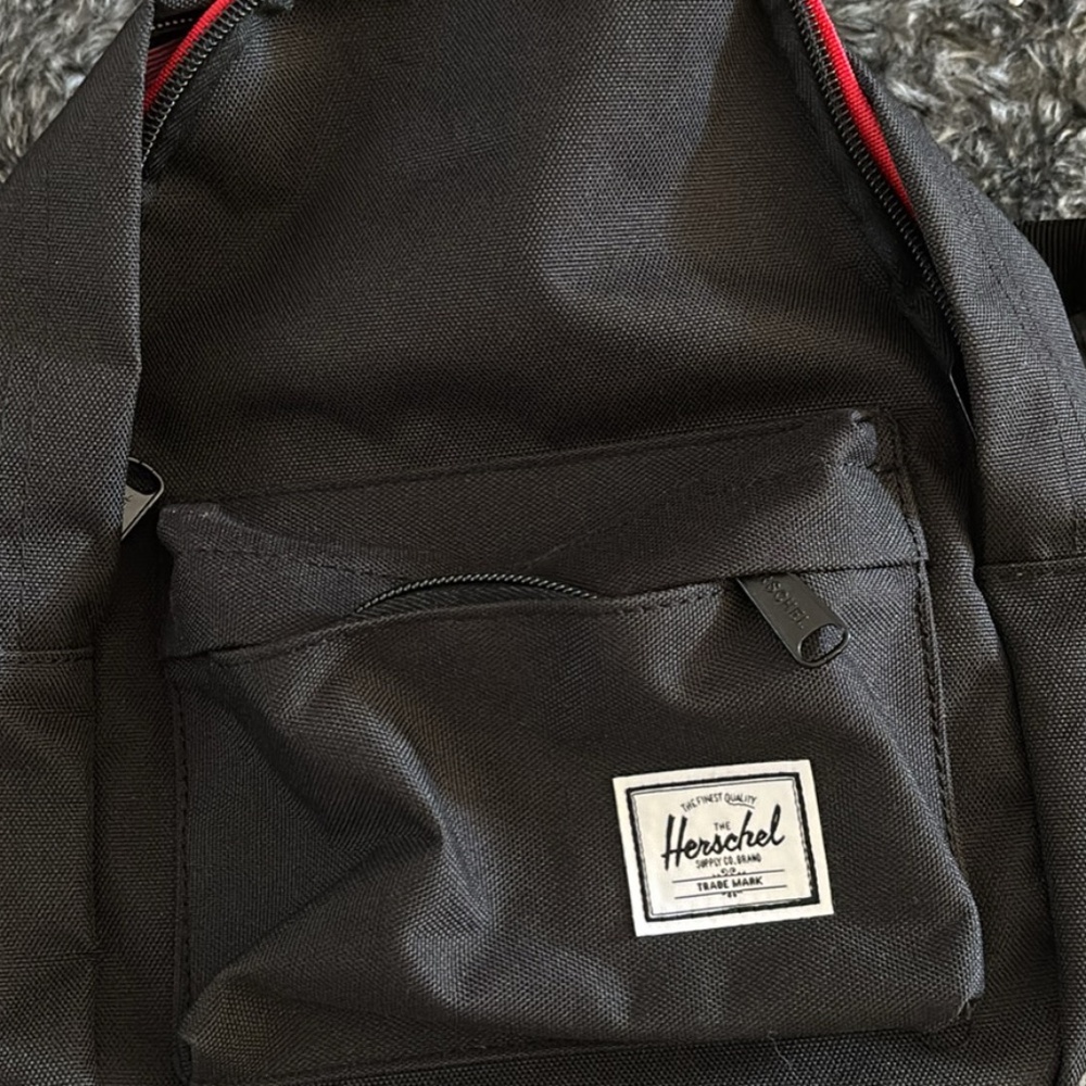 Herschel backpack with red interior
